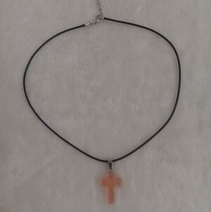 Elegant Black Necklace with Peach Cross Pendant
